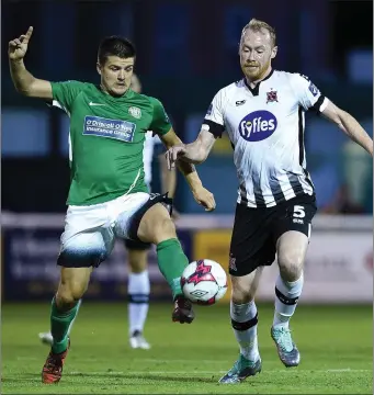  ??  ?? Jake Kelly of Bray Wanderers in action against Chris Shields of Dundalk.