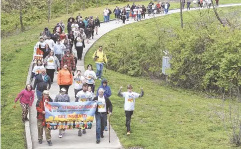  ?? STAFF FILE PHOTO ?? Walkers in a previous Strides of March in Renaissanc­e Park.