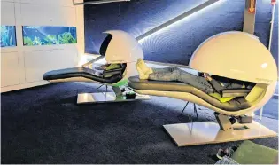  ?? CP PHOTO/GOOGLE CANADA ?? A Google Canada employee reclines on one of two nap pods at its offices in Kitchener, Ont., in this undated handout photo. Google Canada spokesman Aaron Brindle says nap rooms can be found in the tech giant’s offices around the world, including the Toronto office where a wellness space for nursing mothers can be reserved for taking a break, or taking a nap.