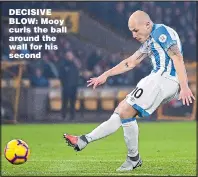  ??  ?? DECISIVE BLOW: Mooy curls the ball around the wall for his second