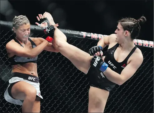  ?? GETTY IMAGES ?? Mackenzie Dern kicks Ashley Yoder during her split decision win last night in Las Vegas in the undercard.