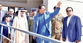  ?? APP ?? FRATERNAL TIES: Prime Minister Imran Khan and UAE Minister for Tolerance Sheikh Nahyan bin Mubarak Al Nahyan during a visit to the Namal University in Mianwali city of Punjab on Sunday. Dubai-based businessma­n Imran Chaudhry is also seen. —
Supplied photo