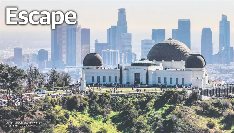  ??  ?? Griffith Park Observator­y with the LA skyline in the background