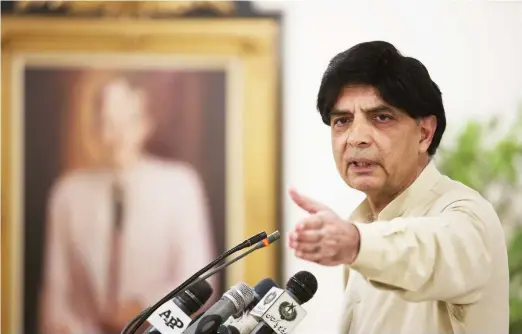  ??  ?? Pakistan’s Interior Minister Chaudry Nisar Ali Khan addresses a news conference in Islamabad in this file photo. (AP)