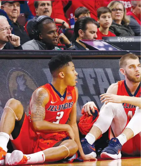  ?? | AP ?? Illini coach Brad Underwood, with Te’Jon Lucas ( 3) and Michael Finke, says his team needs to focus on winning one game at a time.