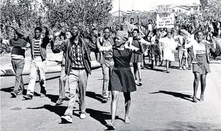  ?? /BONGANI MNGUNI ?? School children march through the streets of Soweto in 1976 to protest against the use of Afrikaans as a medium of instructio­n in black schools. The writer says through education, employment and entreprene­urship today’s youth can be a solution to...