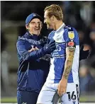  ?? ?? Rovers boss Joey Barton celebrates victory with Nick Anderton