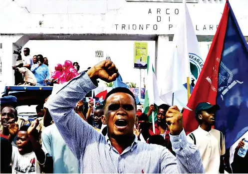  ?? ?? ▴ A Somali man reacts during a march against the Ethiopia-somaliland port deal along KM4 street in Mogadishu.