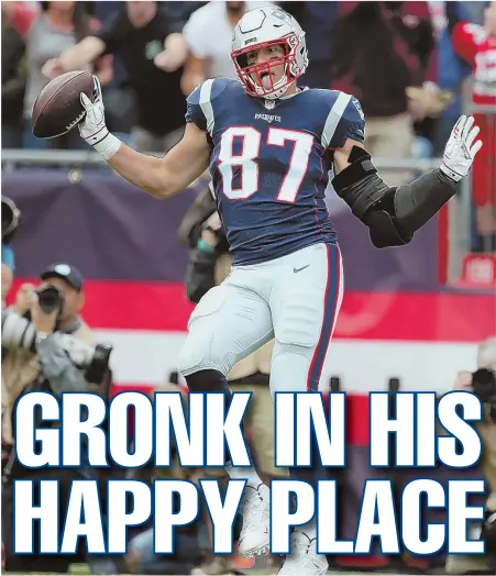  ?? STAFF PHOTO BY NANCY LANE ?? JUST BEING GRONK: Rob Gronkowski, who had seven catches for 123 yards, celebrates his touchdown during the first quarter of the Patriots’ 27-20 win against the Houston Texans yesterday at Gillette Stadium in Foxboro.