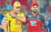  ?? PTI ?? CSK skipper MS Dhoni with RCB counterpar­t Virat Kohli.