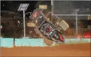  ?? CARL HESS - FOR DIGITAL FIRST MEDIA ?? Young Joey Amatea (#88) goes for a wild ride as his racer climbs the wall and exits the track during the Wingless 600 Micro Sprint 60 lap feature.
