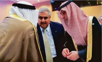  ?? AFP ?? Bahraini Foreign Minister Khalid Bin Ahmed Al Khalifa and Saudi Arabia’s Adel Al Jubeir, right, listen to a delegate at the opening of the Mideast peace conference in Paris yestrday.