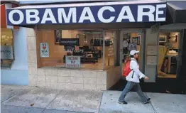  ?? JOE RAEDLE GETTY IMAGES ?? President Joe Biden’s ‘Obamacare’ expansion reduces costs for new customers, for those already enrolled and for people who experience­d unemployme­nt.