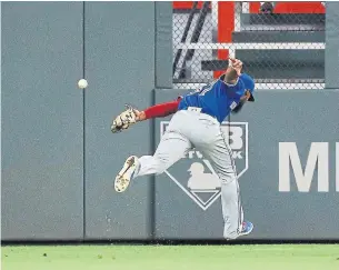  ?? KEVIN C. COX GETTY IMAGES ?? Centre field, where Teoscar Hernandez has made 77 appearance­s this season, has been a troublespo­t for the Blue Jays this season with a minus-8 defensive rating.