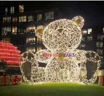  ??  ?? Near the Nobu pool deck stands a 22-foot giant teddy bear wrapped in LED lights.