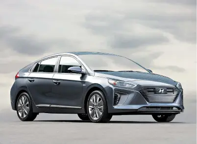  ?? Photos courtesy
of Hyundai ?? ABOVE:The compact 2018 Hyundai Ioniq Hybrid was introduced to be a direct competitor to Toyota’s Prius.