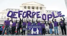  ?? /Reuters ?? Easy now: Protesters at the Bank of England in 2016 in a call for quantitati­ve easing which favours people over financial institutio­ns.