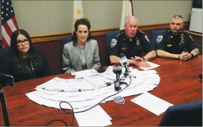  ?? Photo by Joseph B. Nadeau ?? Pictured from left, Woonsocket Tax Assessor Elyse Pare, Mayor Lisa Baldelli-Hunt, Police Chief Thomas F. Oates III and Lt. Thomas Calouro speak to reporters about the city’s efforts to crack down on improperly registered vehicles.