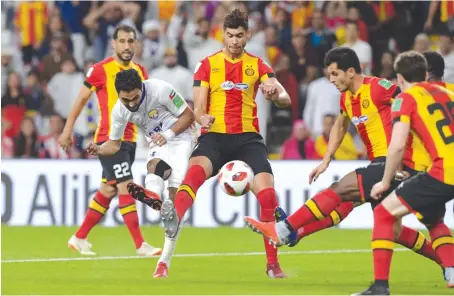  ?? Al-Ain’s Hussein El-Shahat doubles the home side’s lead during their brilliant 3-0 win over African Champions League winners Esperance Sportive de Tunis. ??