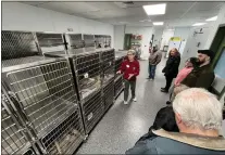  ?? ?? Volunteer Bonnie Bohnenblus­t, Reading, talks about the new Red Creek Wildlife Center Botstiber Clinic.