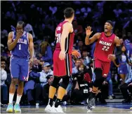  ?? MATT SLOCUM — THE ASSOCIATED PRESS ?? Miami Heat’s Jimmy Butler (22) reacts during the second half of Game 6 of an NBA basketball second-round playoff series against the Philadelph­ia 76ers, Thursday, May 12, 2022, in Philadelph­ia.