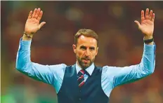  ?? Rex Features ?? Southgate current salary is understood to be £1.8 million ($2.4 million) a year, with bonuses.