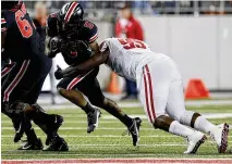  ?? JAY LAPRETE/ASSOCIATED PRES ?? Ohio State’s Dallan Hayden, a true freshman running back from Memphis, Tenn., picked up the slack last week when Miyan Williams suffered a lower leg injury in the second quarter. “It was a crazy turn,” Hayden said.