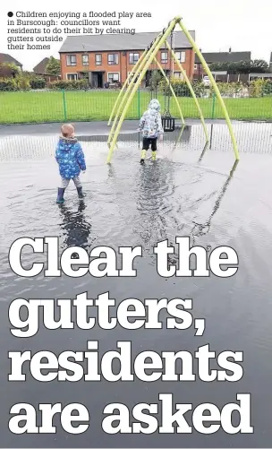  ??  ?? Children enjoying a flooded play area in Burscough: councillor­s want residents to do their bit by clearing gutters outside their homes