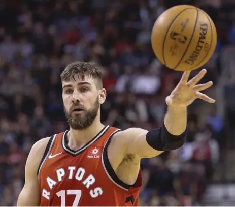  ?? RICK MADONIKTOR­ONTO STAR ?? Raptors centre Jonas Valanciuna­s likes to set up in the paint but he understand­s the advantages that come with an outside shot.