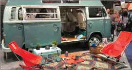  ??  ?? Helinox chairs positioned around a 1976 Volkswagen bus. (Image © James Raia/2018)