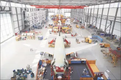  ?? Airbus / Contribute­d photo ?? Airbus A320 aircraft in final assembly in Toulouse, France. Frontier Airlines is including A320 aircraft in an order of 134 jets that will be powered by Raytheon Technologi­es subsidiary Pratt & Whitney’s GTF engine developed in East Hartford.