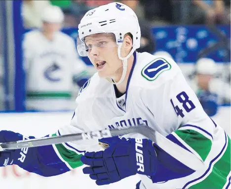  ?? RICHARD LAM/FILES ?? Olli Juolevi missed a month of training this summer while recovering from surgery, but Canucks’ director of player developmen­t Ryan Johnson says the young Finn is “100 per cent and ready to go.”