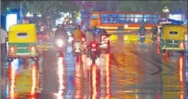  ?? RAJ K RAJ/HT PHOTO ?? Connaught Place after heavy rainfall on Thursday. Hail was reported from across Delhi and adjoining NCR towns of Noida, Faridabad and Ghaziabad.