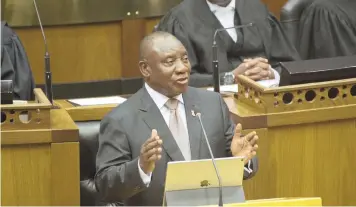  ?? ROGER BOSCH EPA-EFE ?? PRESIDENT Cyril Ramaphosa delivers the State of the Nation Address (Sona) in parliament, last Thursday. The Sona tables a programme of action for the year and accounts for progress made since the previous commitment­s. |