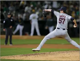  ?? GODOFREDO A. VÁSQUEZ — THE ASSOCIATED PRESS ?? Shane Bieber throws to an Athletics batter during the sixth inning March 28in Oakland, Calif.