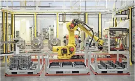  ??  ?? The Infiniti Decherd Powertrain Plant in Decherd, Tenn., features many robots and other automation. SANFORD MYERS / THE TENNESSEAN