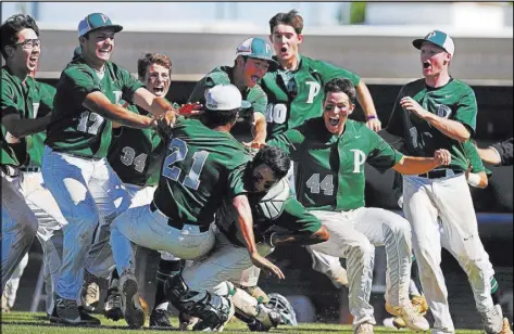  ?? Josh Holmberg Las Vegas Review-Journal ?? Palo Verde players jump for joy after sweeping Centennial in two games Saturday to win the Class 4A Sunset Region title at Shadow Ridge High School.