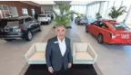  ?? ERIC SEALS/DETROIT FREE PRESS ?? Ralph Shaheen, president of Shaheen Cadillac in Lansing, has had his Cadillac dealership fitted in anticipati­on of electric vehicle sales.