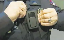  ?? Photograph­s from Fox-5 San Diego ?? A NEW SAN DIEGO city report found that the use of body cameras by police has led to fewer complaints by residents and less use of force by officers.