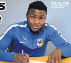  ??  ?? Bright Enobakhare puts pen to paper for Sky Blues