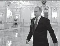  ?? AP/ALEXEI DRUZHININ ?? Russian President Vladimir Putin arrives Thursday to give his annual state of the nation address at the Kremlin in Moscow.