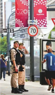  ?? Reuters ?? Coast Guard personnel secure the Saudi Arabian embassy in Buenos Aires yesterday, ahead of the G20 summit.