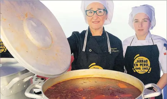  ?? MAP ?? María Dolores Chardí, de El Sequer de Silla, muestra su «arròs en perol amb anec»