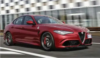  ?? ALFA ROMEO ?? The Alfa Romeo Giulia sedan plays a mainstream role with attractive Italian styling and the unmistakab­le Alfa Romeo front end.