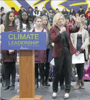  ?? RYAN JACKSON/EDMONTON JOURNAL ?? Premier Rachel Notley explains the NDP government’s climate change plan to students at Queen Elizabeth High School in Edmonton on Wednesday.