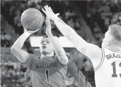  ?? CARLOS OSORIO/ASSOCIATED PRESS ?? Maryland guard Anthony Cowan Jr. has struggled since a dominant four-game stretch in January when he averaged nearly 23 points and five assists. In the six subsequent games, Cowan has averaged just over 10 points and five assists while shooting 31.9 percent overall.
