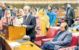  ?? AP ?? In this photo released by the National Assembly office, Pakistan’s newly elected Prime Minister Shehbaz Sharif (fourth left) delivers his speech following his appointmen­t, at a parliament session, in Islamabad.