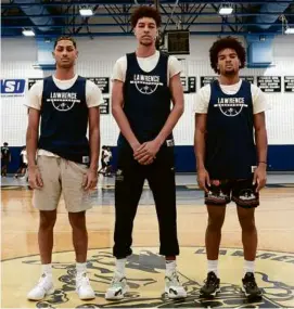  ?? DANIELLE PARHIZKARA­N/GLOBE STAFF ?? Lawrence senior captains (from left) Obbie Luciano, Igor Gonzalez, and Joendy Rosario all shine on and off the court.