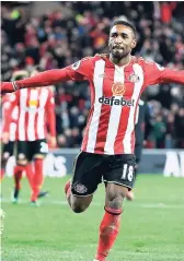  ??  ?? Sunderland's Jermain Defoe celebrates scoring his side's second goal during the English Premier League match at the Stadium of Light in Sunderland, England, yesterday. The game ended 2-2.