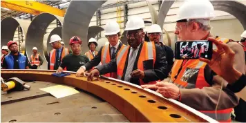  ?? SIYABULELA DUDA | GCIS ?? President Cyril Ramaphosa was joined by Trade and Industry Minister Rob Davies on a guided tour of the GRI Towers factory during the official launch of the Special Economic Zone in Atlantis yesterday.